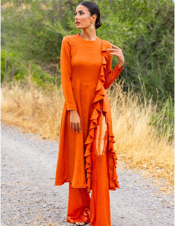 Party outfit with tunic and sequined long pants