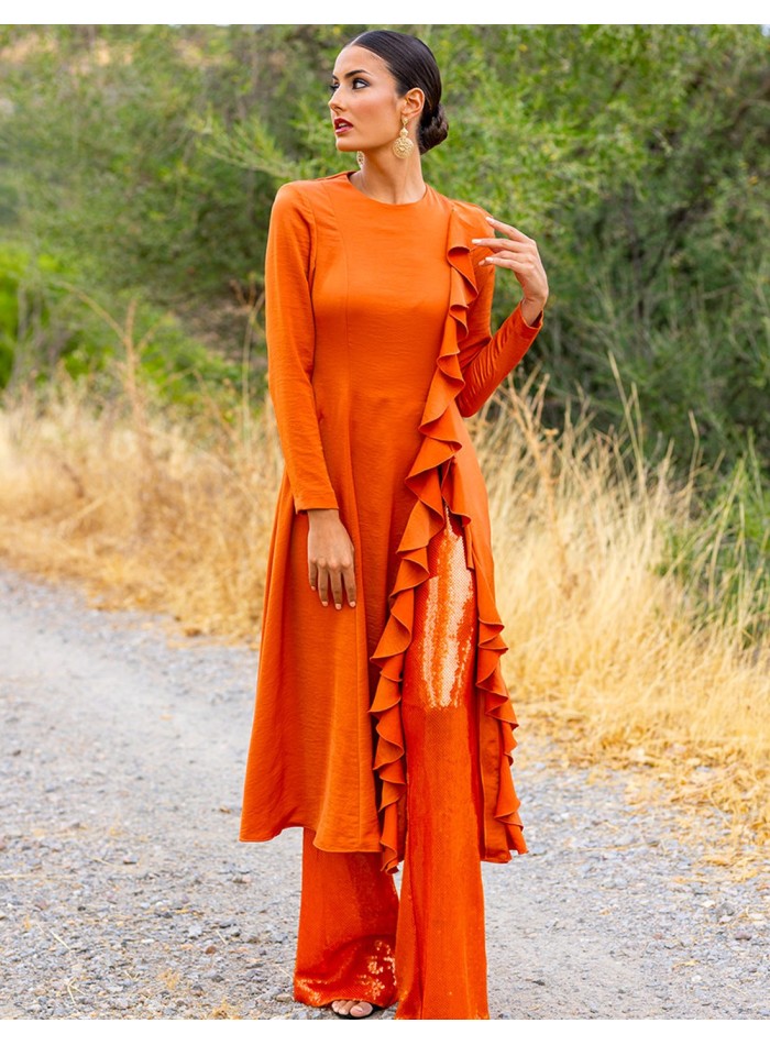 Party outfit with tunic and sequined long pants