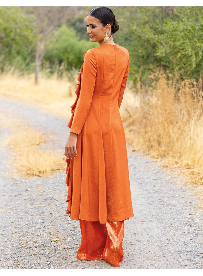Party outfit with tunic and sequined long pants orange