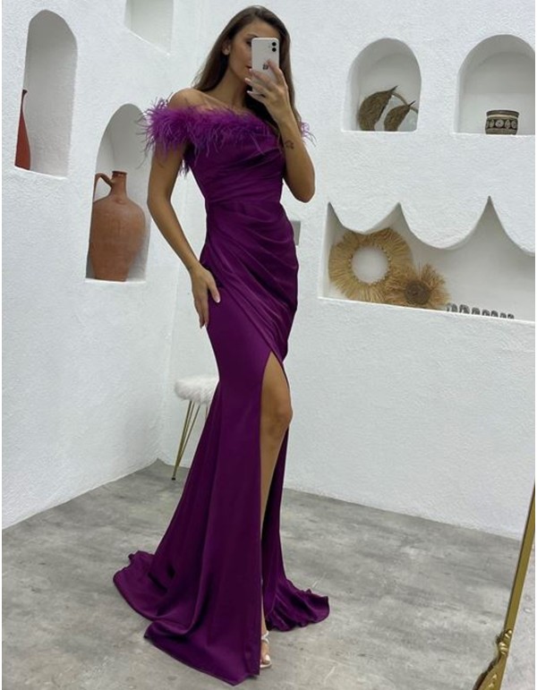 Long party dress with feathered bardot neckline and side...