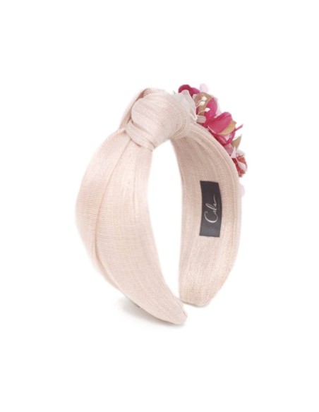 Bandeau rose noué avec des fleurs préservées