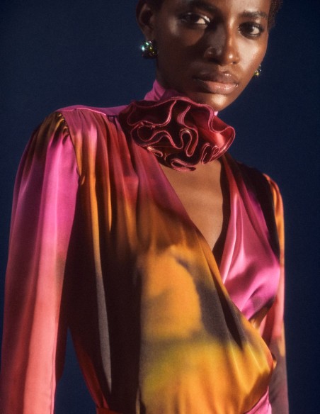 Satin party blouse with crossover neckline and floral embellishment