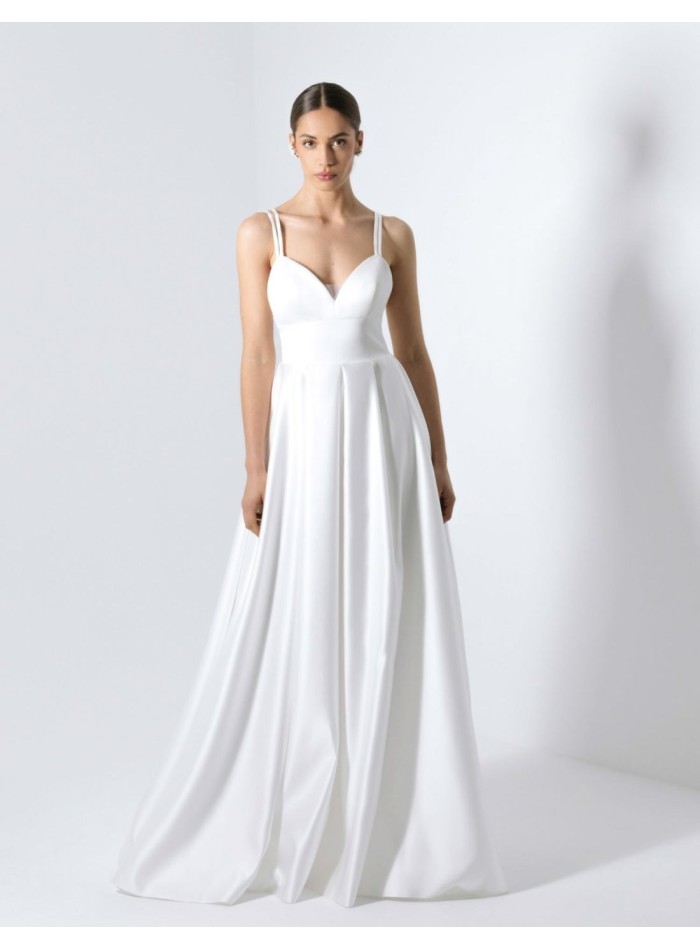 Vestido de novia con corte princesa y espalda...