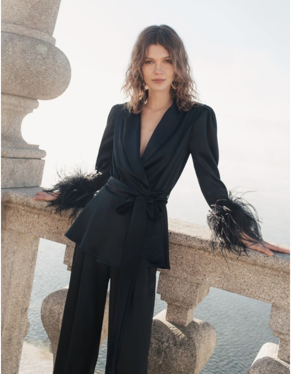 Black crossover blouse with lapels and feathers