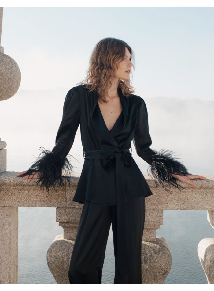 Black crossover blouse with lapels and feathers