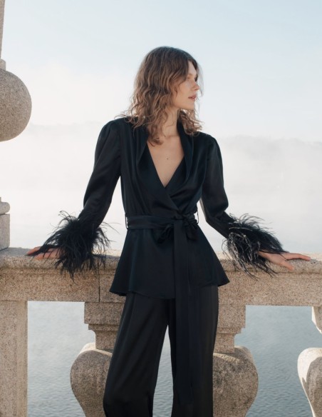 Black crossover blouse with lapels and feathers