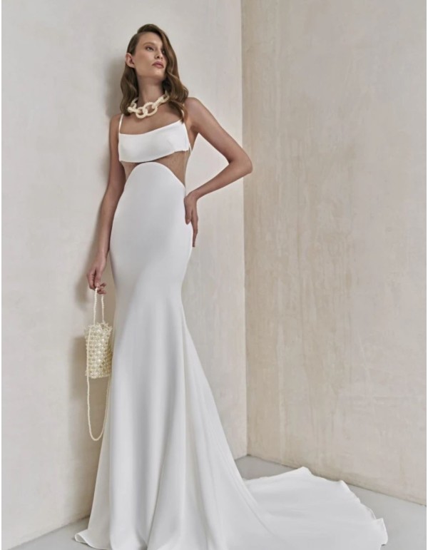 Longue robe de mariée ivoire découpée avec de la maille