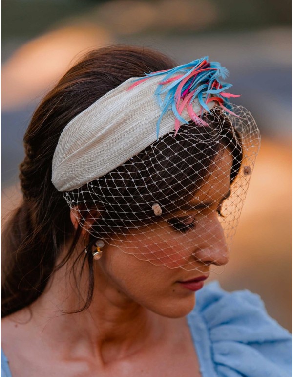 Sinamay guest headband with jewellery pieces and feathers 2