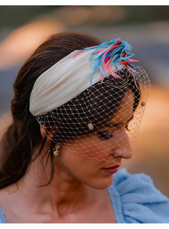 Sinamay guest headband with jeweled pieces and...