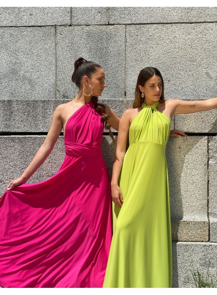 Vestido largo multiposicion en color rosa barbie y verde, con la tendencia barbiecore de esta primavera verano.