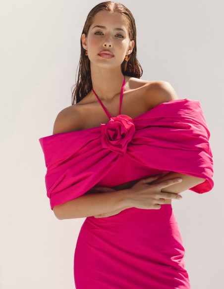 Top de fiesta anudado con mangas caídas y detalle flor fucsia