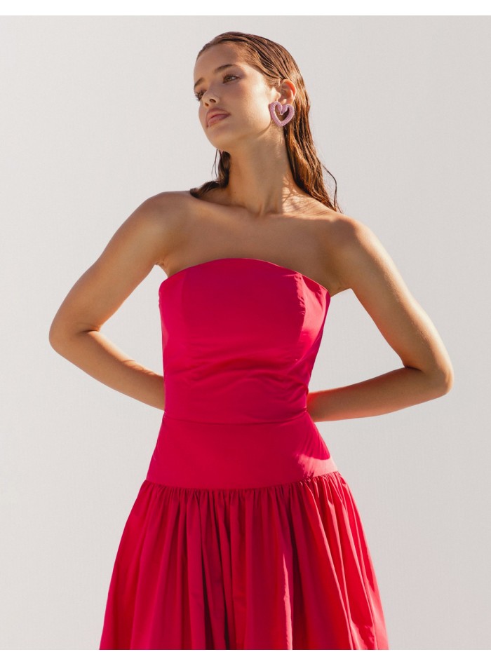 Long party dress with arched bandeau neckline for guests