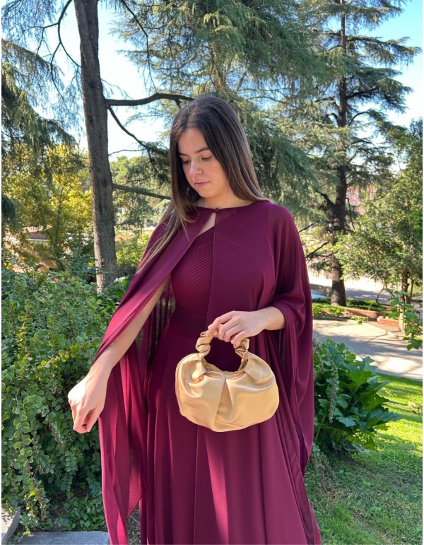 Multi-position guest cape in garnet color.