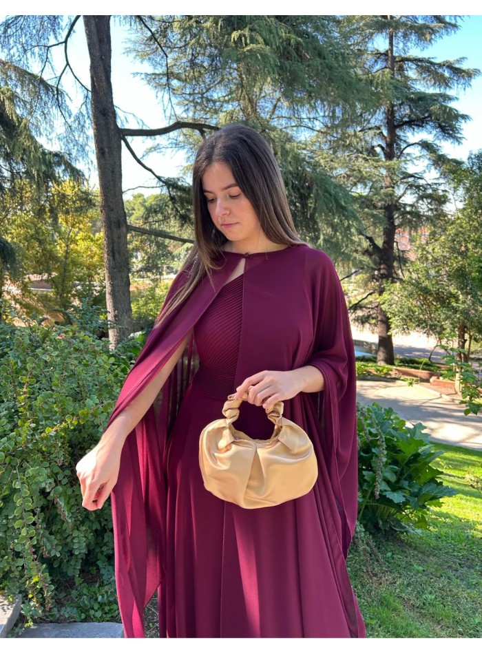 Multi-position guest cape in garnet color.