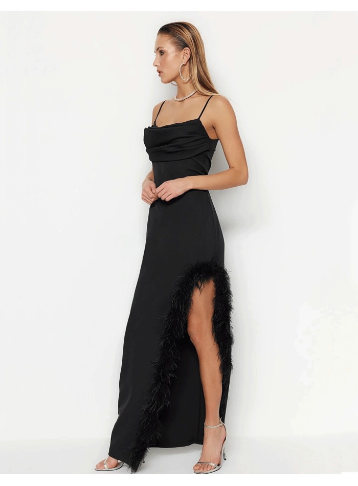 Black evening dress with feathered slit