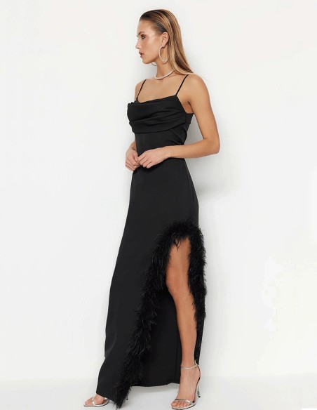 Black evening dress with feathered slit