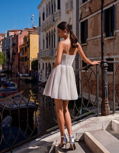 Shiny mini dress with flared skirt