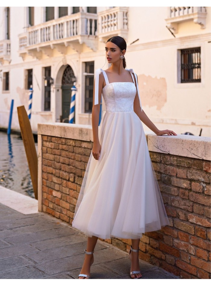 Vestido de fiesta midi con tirantes lazo y...