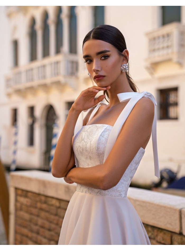 Vestido de fiesta midi con tirantes lazo y...