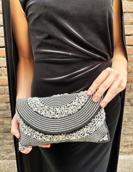 Black evening clutch bag with white crystals