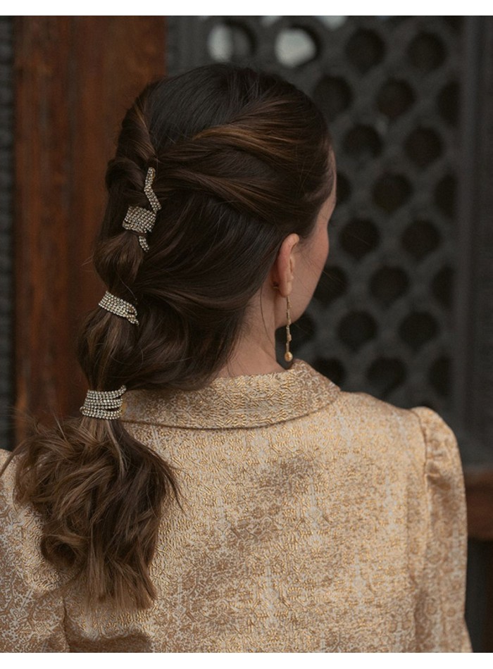 Golden printed party blouse with puffed sleeves