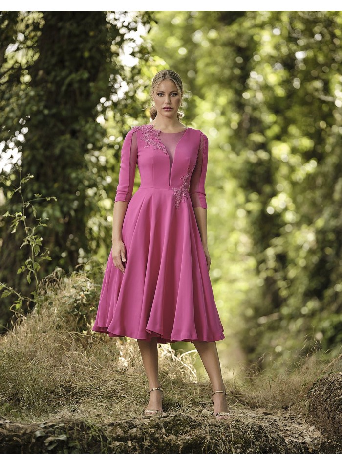 Robe de cocktail avec corsage transparent et...