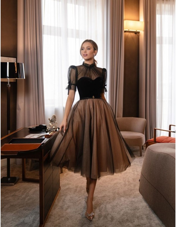 Haute Couture midi party dress for guests.