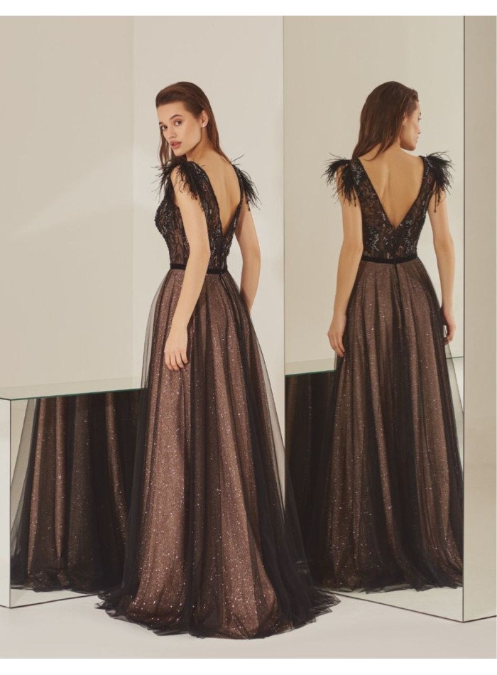 Long black party dress in tulle with feathers...
