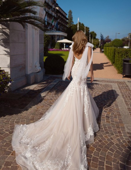 Nude wedding dress with V-neckline and V-back, lace and bows