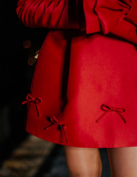 Mini party dress with bardot neckline and bow details