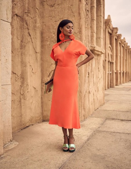 Orange midi party dress for guests.