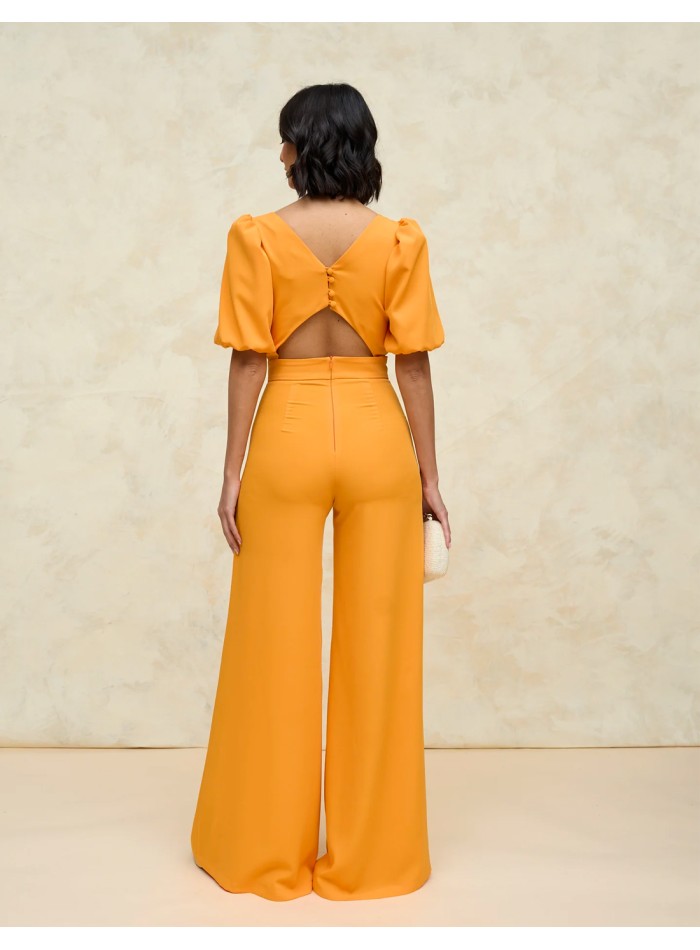 Mono de fiesta con manga abullonada para invitada