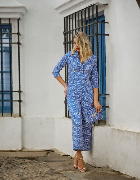 Printed party jumpsuit with gold buttons