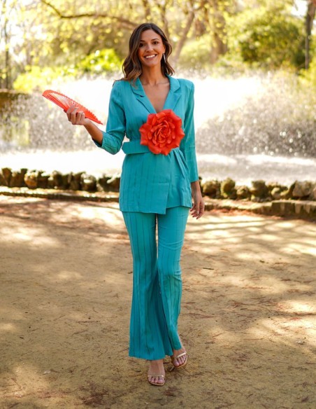 Suit with belted jacket and long striped pants