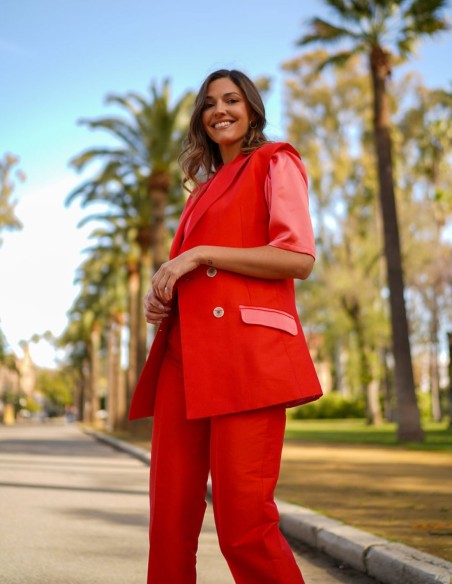 Orange silk vest with buttons and lined pockets