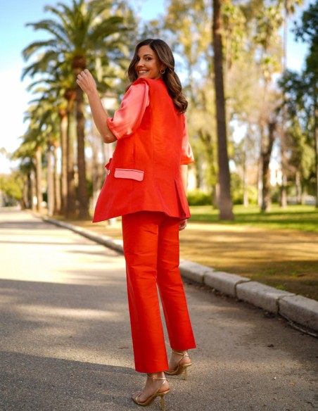 Orange silk vest with buttons and lined pockets