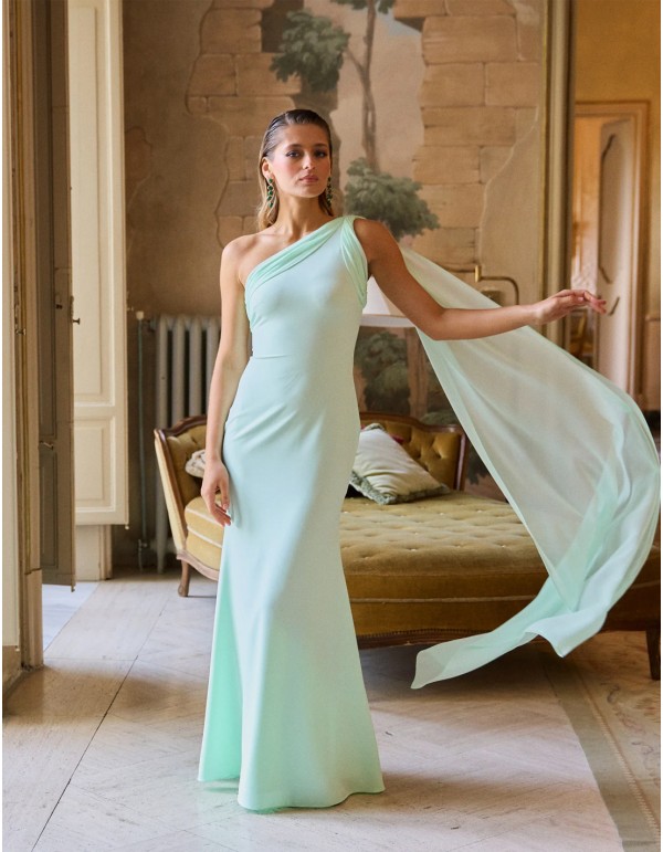 Long party dress with asymmetrical neckline and cape detail