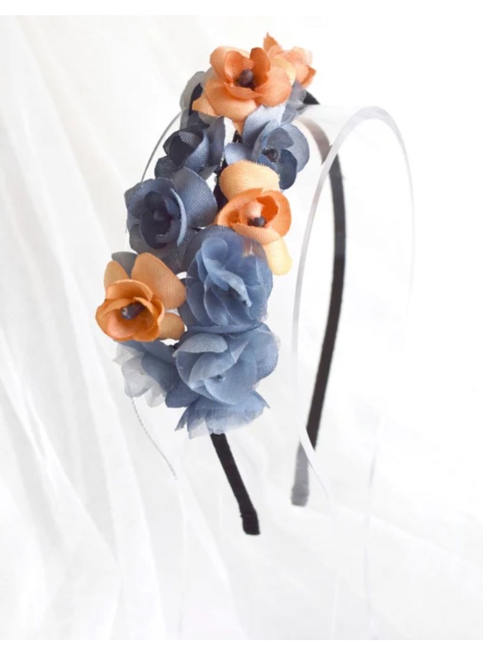 Diadema fina con florecitas azules y naranjas