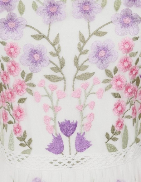 Long white dress in tulle embroidered with flowers