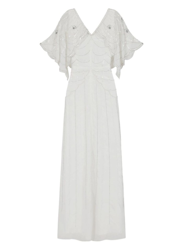White wedding dress with raised sleeves and...
