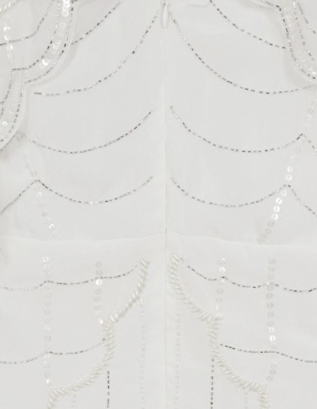 Robe de mariée blanche avec manches relevées et sequins