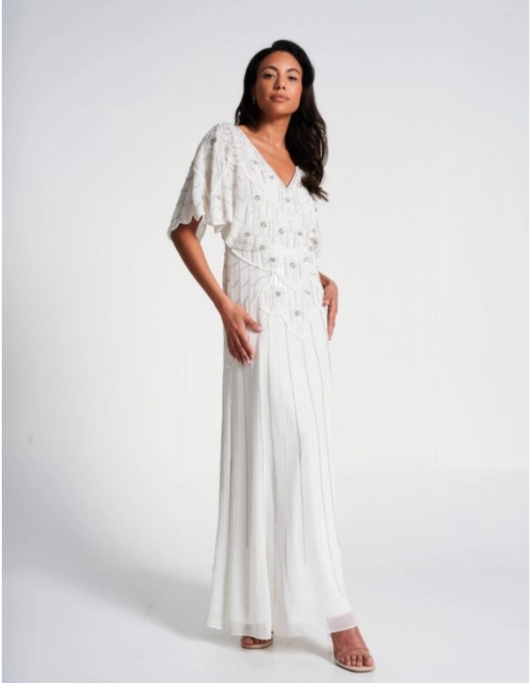 Robe de mariée blanche avec manches relevées et sequins 2