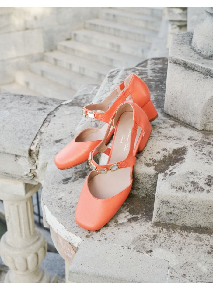 Coral pumps with stone buckle embellishment