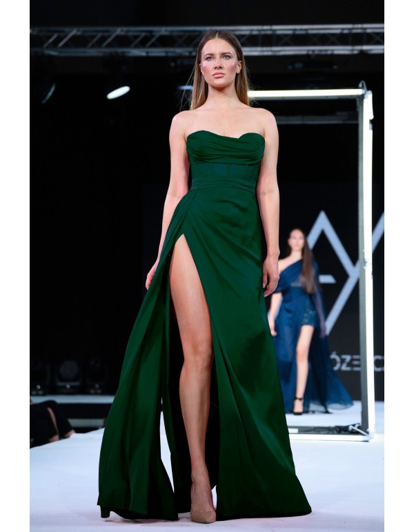 Long green evening dress with high neckline and high leg...