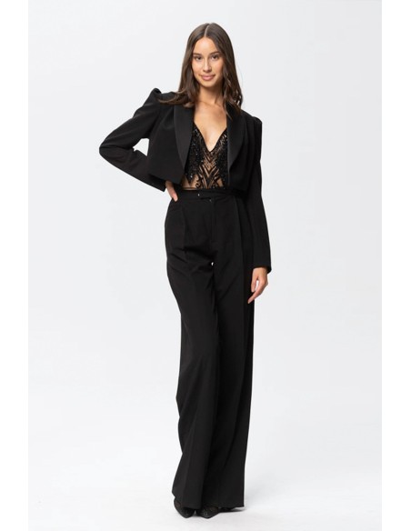 black cropped blazer with long sleeves and a puffed effect