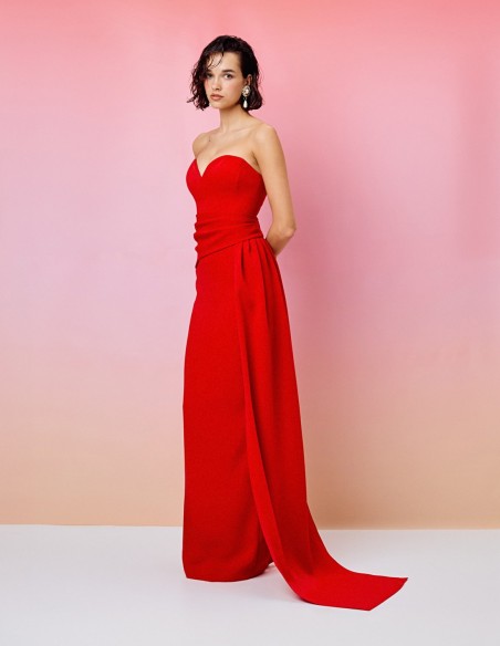 Robe longue de fête avec encolure cache-coeur et décolleté plongeant sur le côté