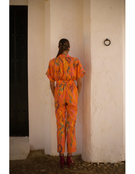 Printed party jumpsuit with raglan sleeves and tuxedo neckline