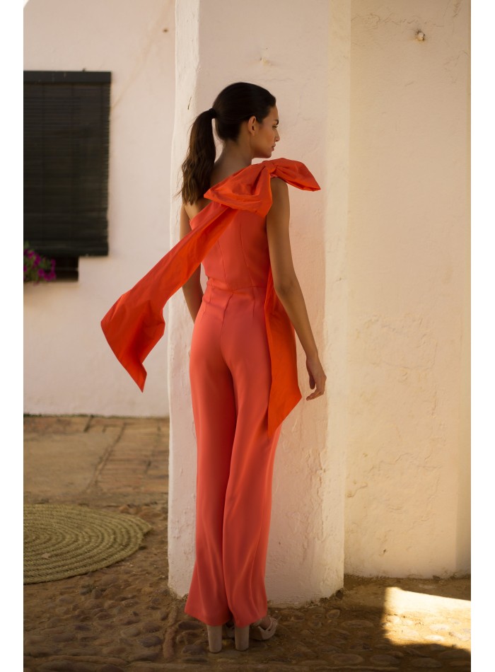 Long party jumpsuit with asymmetrical neckline...