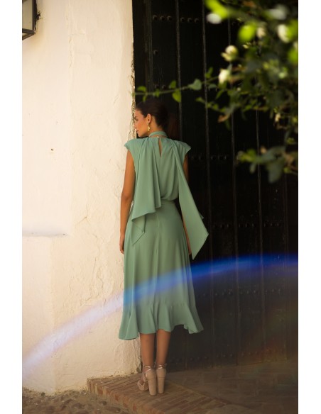 Top and skirt set with aqua green flouncy cross over skirt