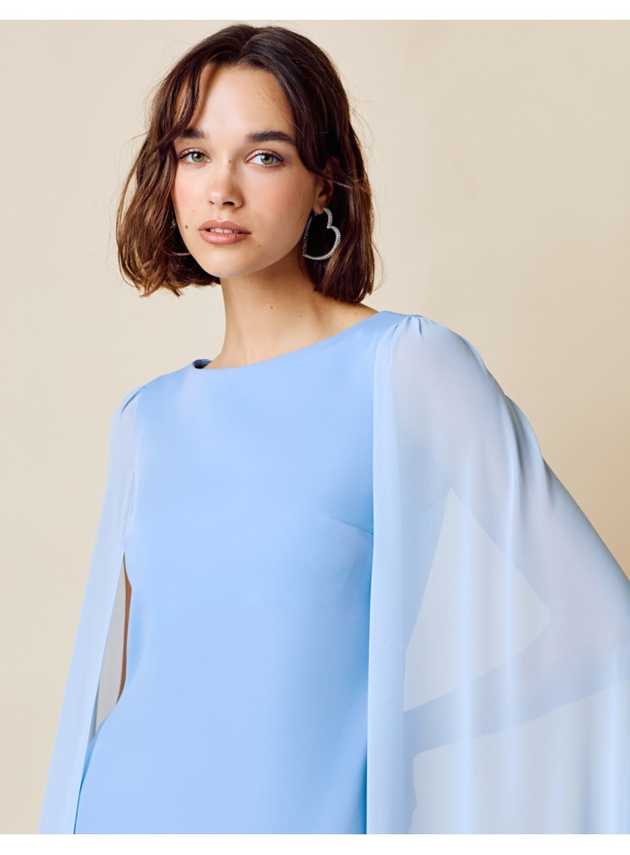 Long party dress with round neckline and cape...